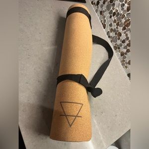 Lightly used cork yoga mat. Portugese cork. Comes with carry strap